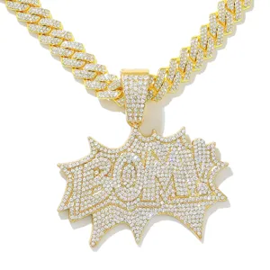 Detailed macro shot of iced out BOM! pendant necklace with gold Cuban link chain
