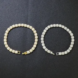 Macro view of 6mm gold and silver ice sugar chains with square clear stones