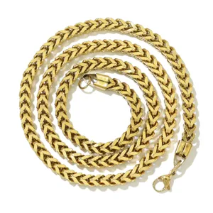 Detailed view of the gold vacuum plated stainless steel Franco chain necklace.
