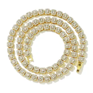 Close-up detail of 6mm gold iced out square link Cuban necklace with rhinestones