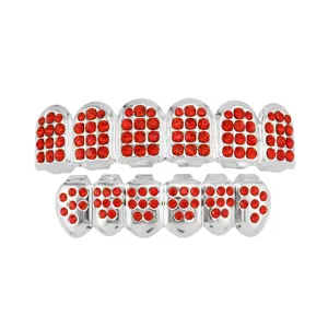 Detail shot of hip hop silver teeth grills featuring inlaid sparkling red rhinestones