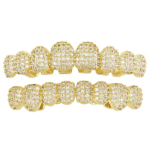 Detailed view of iced out 8-teeth gold grillz set with micro-paved cubic zirconia