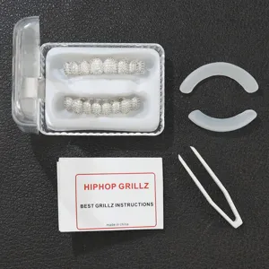 Detailed view of the 8-tooth iced out hip hop grillz set with all accessories
