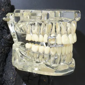 Silbernes hohles Herz Einzelzahn-Grill-Zubehör für Hip-Hop-Style Street-Fashion-Schmuck