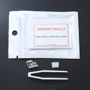 Hollow Heart einzelne Zahn Grillz Set mit Kunststoffpinzette und Anleitungspaket