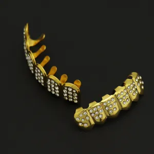 Detailed macro view of 18K gold plated hip hop tooth grills with iced out rhinestones