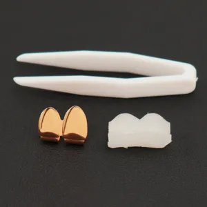 Gold-plated hip-hop double fang grills set including silicone bar and tweezers