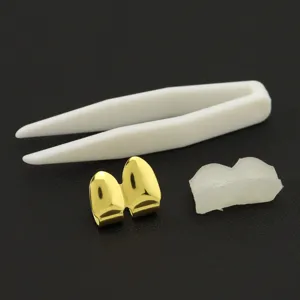 Gold-plated Hip Hop double tooth grillz set with silicone molding bar and tweezers