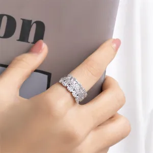 Detailed macro view of an exquisite micro-set zircon full diamond ring worn on a finger