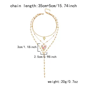 Detailed view of multi-layered gold heart necklace with dimensions and weight info