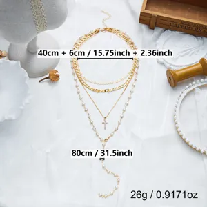 Collier en Y doré à plusieurs couches avec perles élégantes et pendentif en croix détaillé