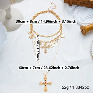 Collier multicouche vintage doré avec pendentifs croix et détails de mesure