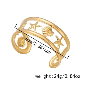 Bracciale rigido dorato in acciaio inossidabile con stella marina e conchiglia, 6 cm