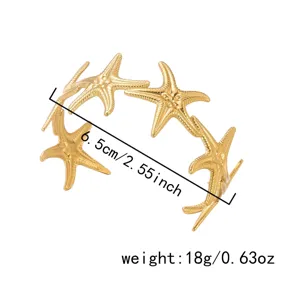 Bracciale rigido a stella marina in acciaio dorato con misura 6,5 cm e peso info