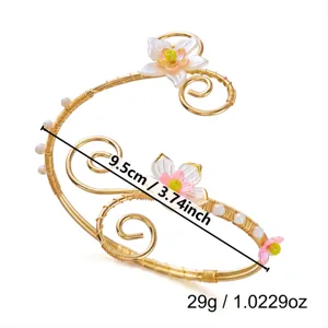 Dettaglio delle dimensioni di 9,5 cm e del peso di 29 g del bracciale da braccio aperto.