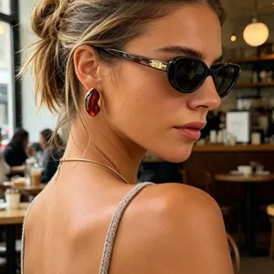 Model wearing vintage gold-set irregular amber earrings and minimalist thin collar necklace