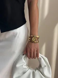 Vintage gold evil eye watch set with heart bracelets lifestyle view