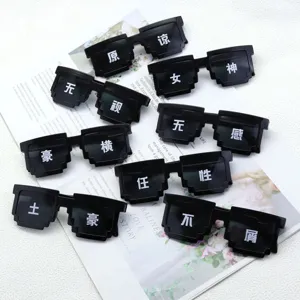 Close-up of black pixel mosaic sunglasses with various Chinese characters on lenses