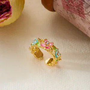 Detailed close-up of a vintage enamel flower open ring featuring colorful hollow vine design