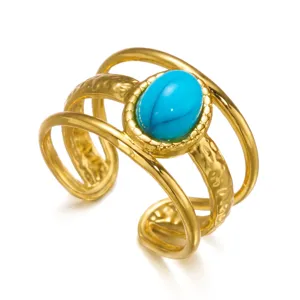 Anello vintage dorato multifilare con pietra di turchese ovale centrale