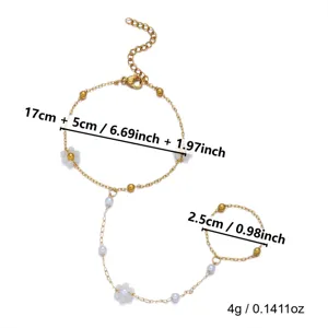 Dettaglio catena mano fiore oro con lunghezza regolabile 17+5cm e peso di 4g.