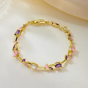 Detailed view of a gold-plated vine bracelet featuring colorful marquise-cut stones.
