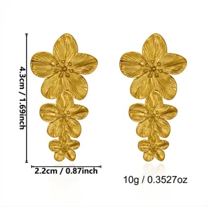 Detailed view of vintage gold flower earrings showing height, width, and weight dimensions