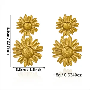 Detailed view of vintage gold flower earrings with size and weight measurements
