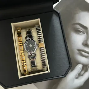 Elegant silver watch with black octagonal dial and diamond-set bracelets gift set.