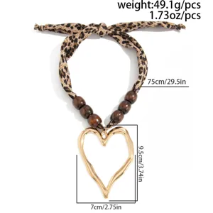 Dimensions of leopard print silk scarf necklace with golden lava heart pendant