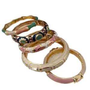 Stack of colorful enamel bamboo bangles with high-quality gold-tone drip glaze finish
