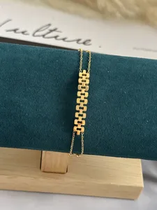 Elegant gold-tone multi-layered chain bracelet with unique linked design for women
