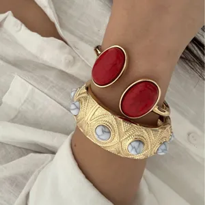 Bohemian style gold-tone cuff and bangle set featuring large red and white marbled stones