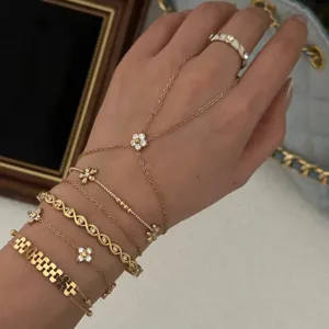 Elegant gold-tone copper flower zircon hand harness and dainty stacked bracelets set