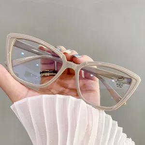 Close-up detail of stylish beige cat-eye anti-blue light blocking glasses for women.