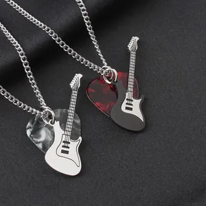 Detail view of rock guitar and marble pick pendants on stainless steel necklaces