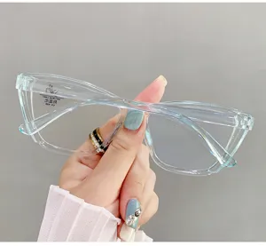 Detailed close-up of stylish oversized cat-eye anti-blue light glasses for women.