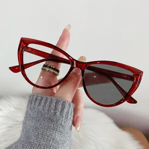 Vintage red cat-eye glasses with photochromic blue light blocking lenses for women.