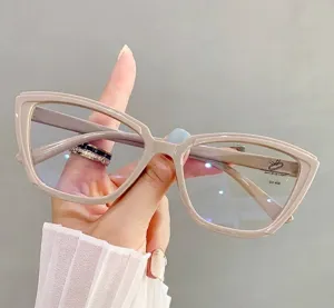 Detail shot of stylish khaki cat-eye glasses with anti-blue light filter lenses.