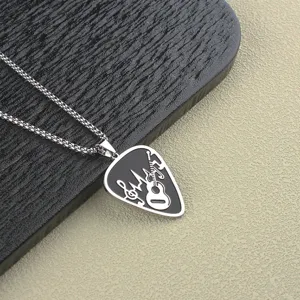 Detailed view of men's stainless steel guitar pick necklace with rock music notes pendant.