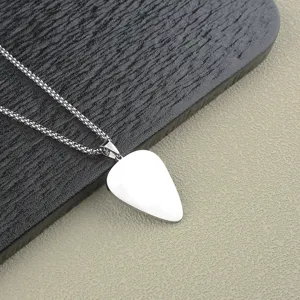 Men stainless steel guitar pick pendant necklace for rock music fans jewelry detail shot.