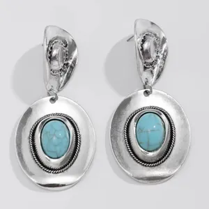 Vintage silver-tone cowboy hat dangle earrings featuring oval faux turquoise stones