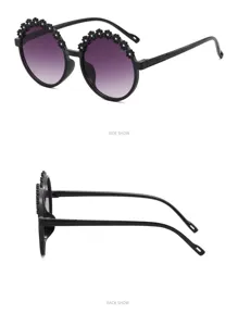 Detailed side and back view of children's round floral sunglasses with purple lenses