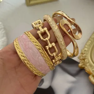 Detailed view of 4-piece vintage light luxury gold and enamel bracelet set for women