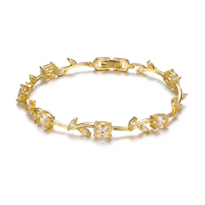 Gold-plated vine bracelet featuring yellow leaf-shaped crystals, elegant jewelry piece