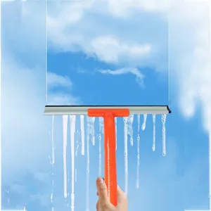 Close-up detail showing the seamless water-scraping effect of the orange window glass squeegee.