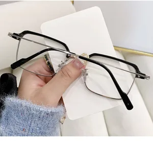 Detail view of retro semi-rimless browline square glasses with silver and black frame