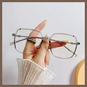 Montatura per occhiali quadrati oversize anti-luce blu per donna in grigio trasparente