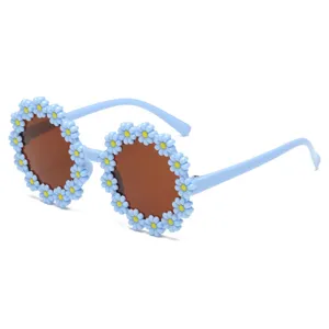 Süße hellblaue Gänseblümchen-Sonnenbrille für Kinder mit runden dunklen Gläsern Zubehör