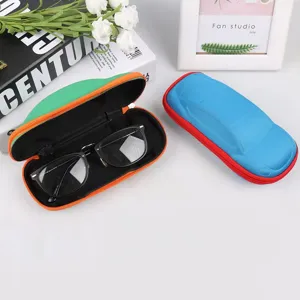 Detail view of colorful car-shaped EVA hard shell glasses cases for children's eyewear